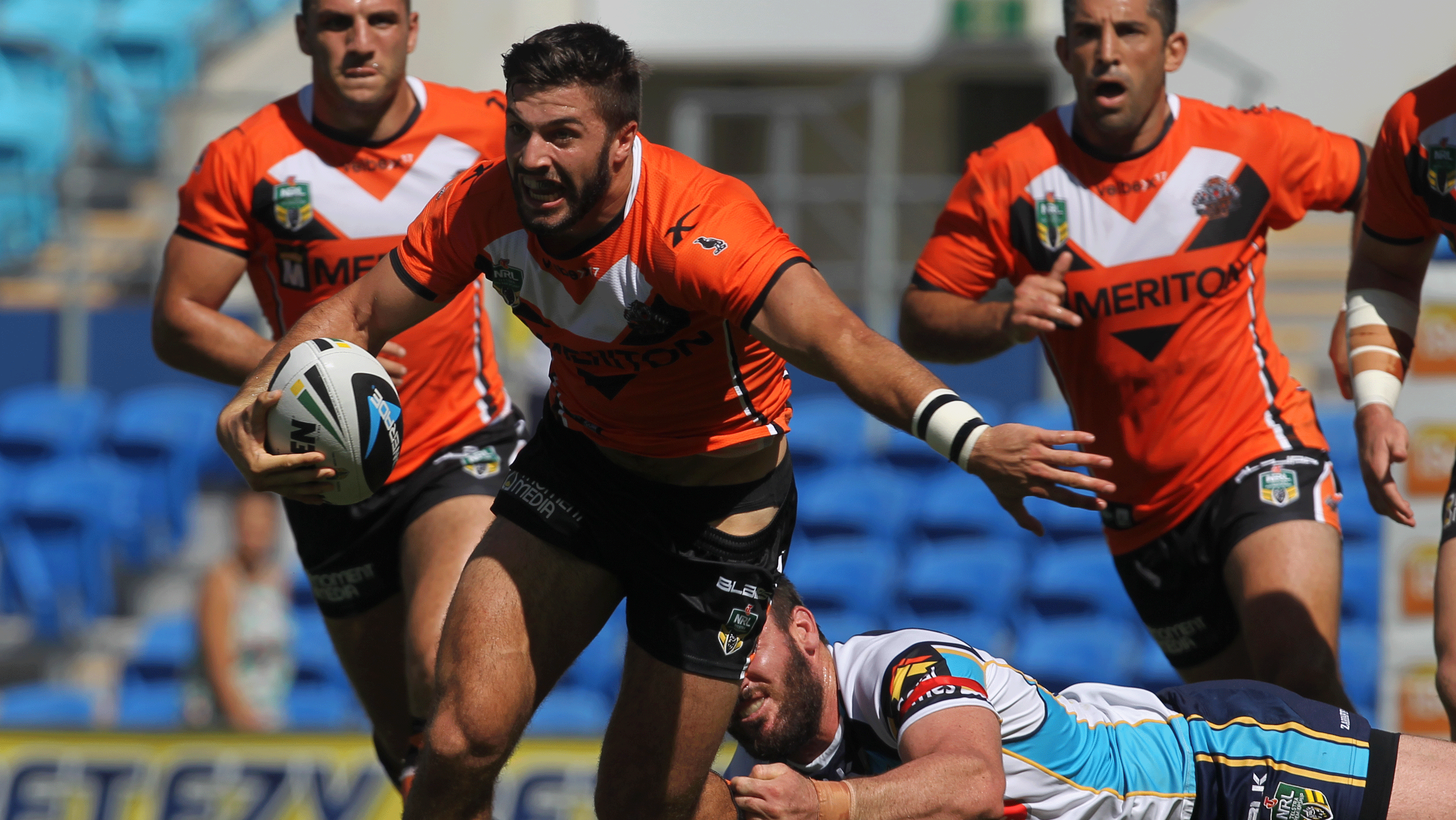 James Tedesco on the charge for Wests Tigers during their rout of the Titans.