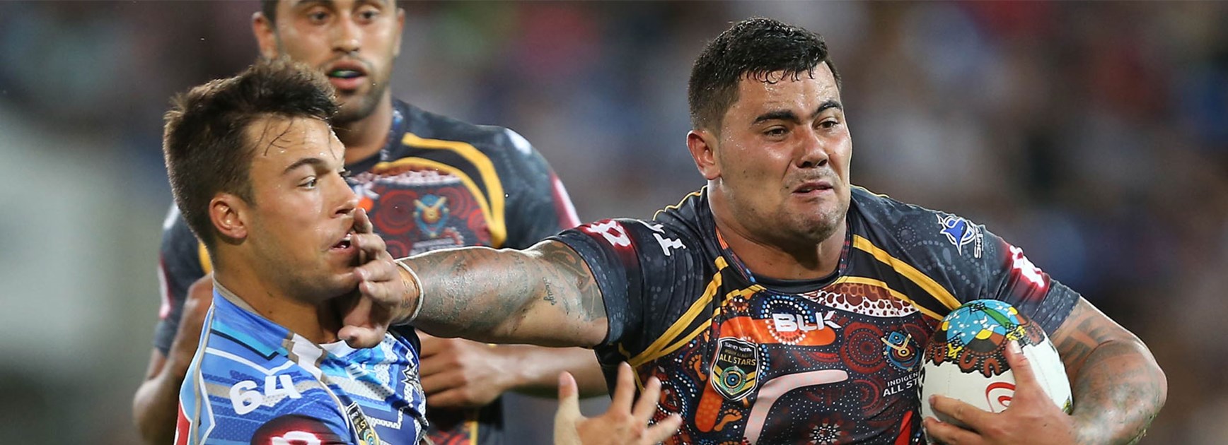 Sharks forward David Fifita introduces his fend to Wests Tigers halfback Luke Brooks during NRL All Stars game.