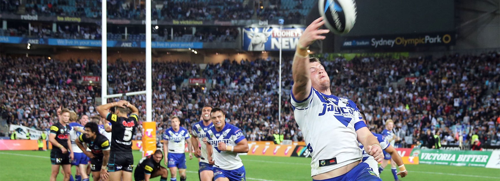 Josh Morris celebrates scoring in last year's finals clash against the Panthers.
