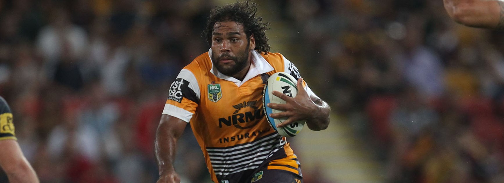 Sam Thaiday charges at the Cowboys defence in Round 3.