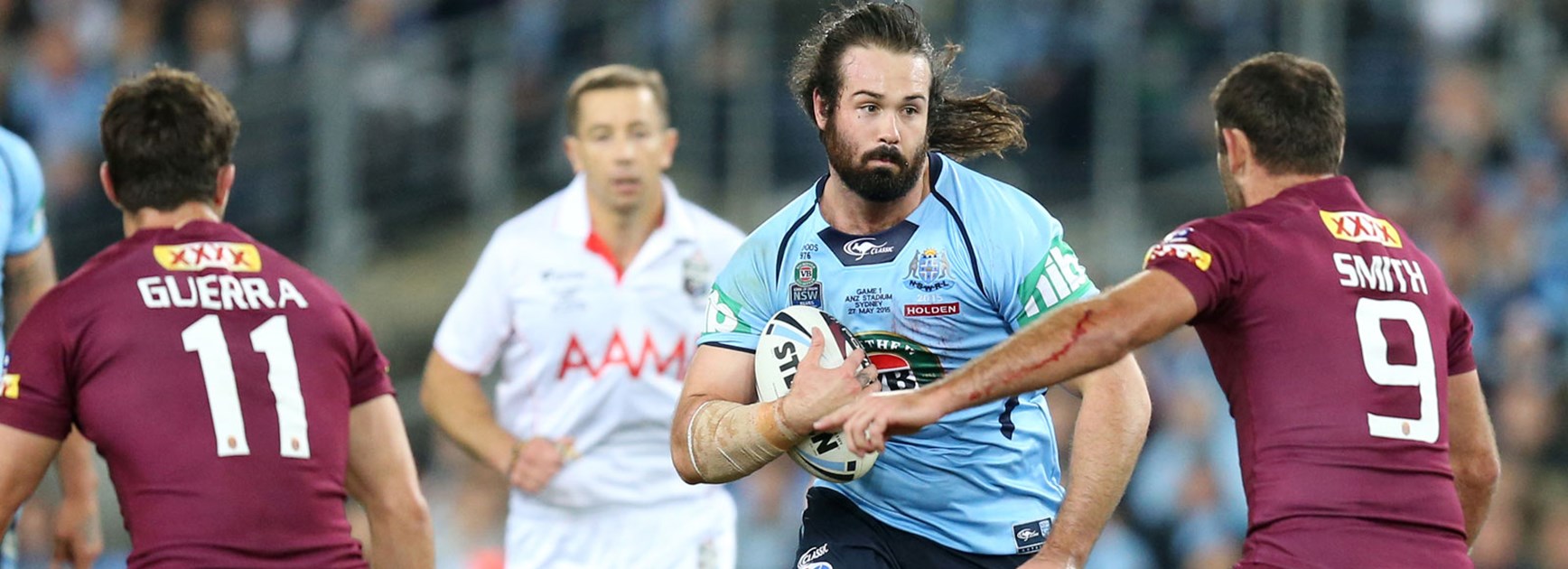 Blues prop Aaron Woods charges forward in Game One of the 2015 Holden State of Origin series.