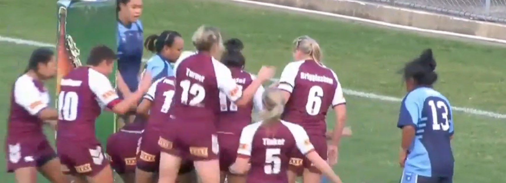 Queensland score against NSW on their way to a 16th consecutive victory in 2014.