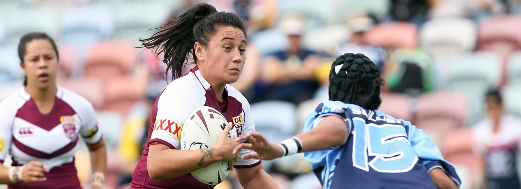 Queensland's Annette Brander takes on the NSW defence on Saturday.