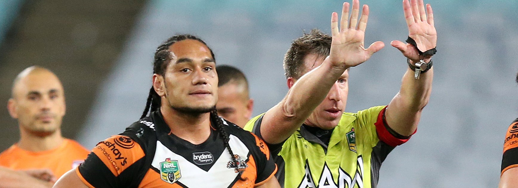 Wests Tigers forward Martin Taupau copped 10 minutes in the sin-bin for a swinging arm on Roosters five-eighth James Maloney.