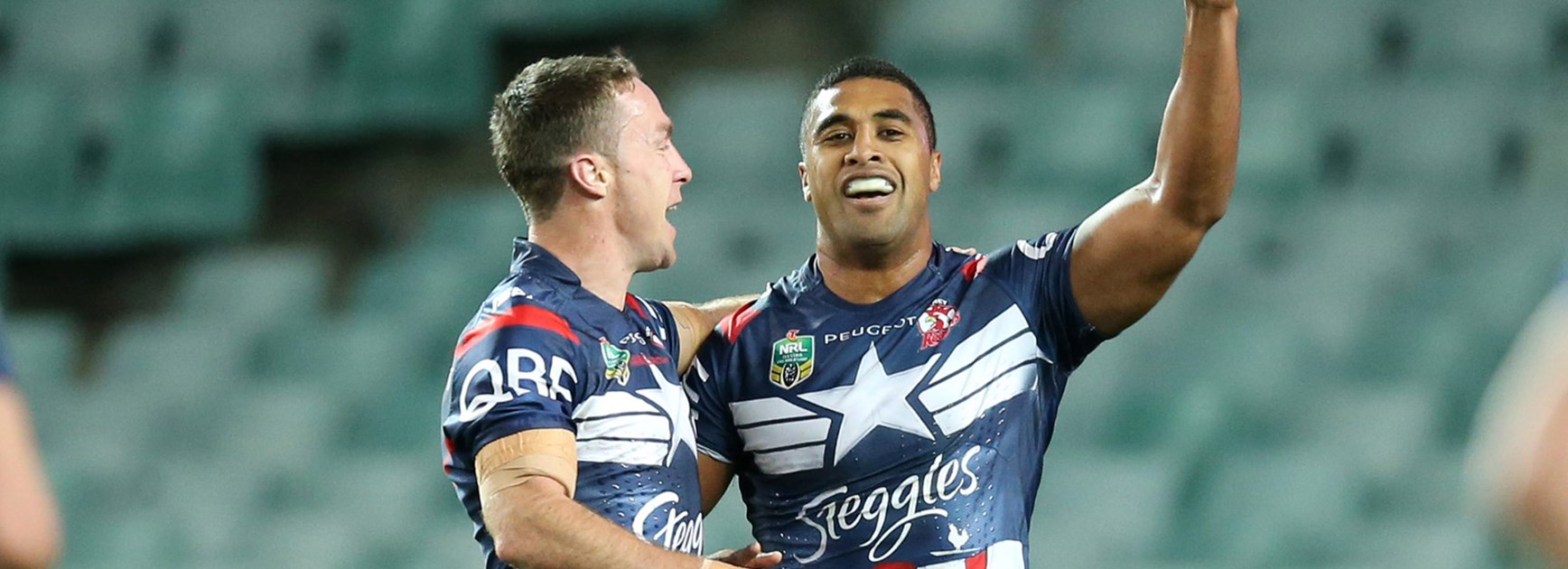 Michael Jennings and James Maloney in the Roosters' win over the Dogs.