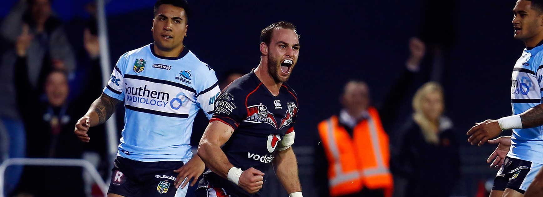 Simon Mannering celebrates his first try of the season against the Sharks.