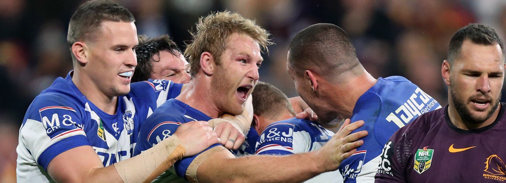 Aiden Tolman celebrates his try against the Broncos in Round 22.