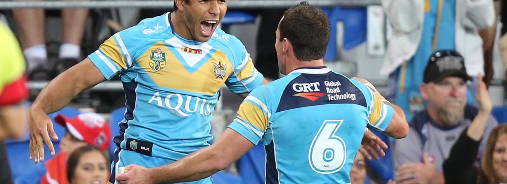 David Mead celebrates his try to put the Titans in front of the Dragons.