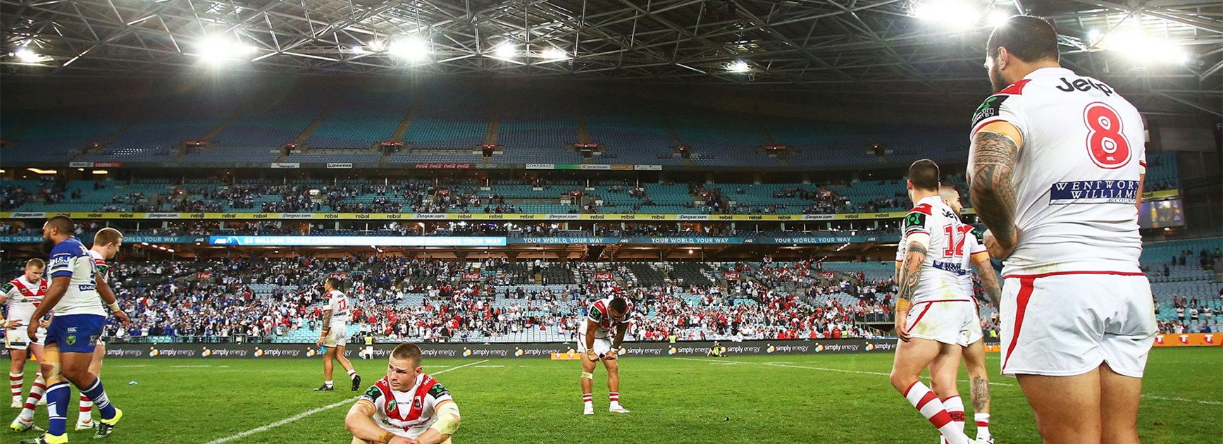 The dejected Dragons after their golden point defeat against the Bulldogs.