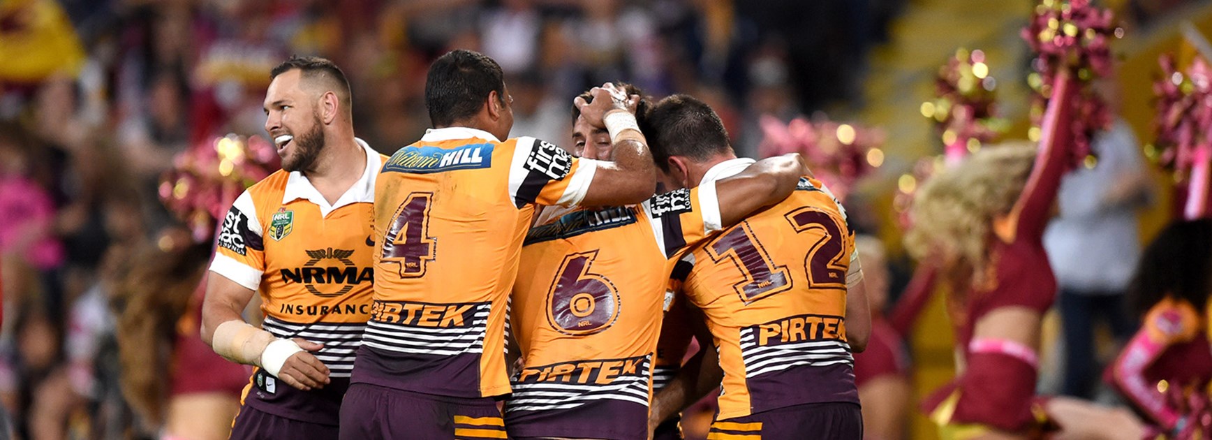 The Broncos celebrate their qualifying final win over the Cowboys at Suncorp Stadium.
