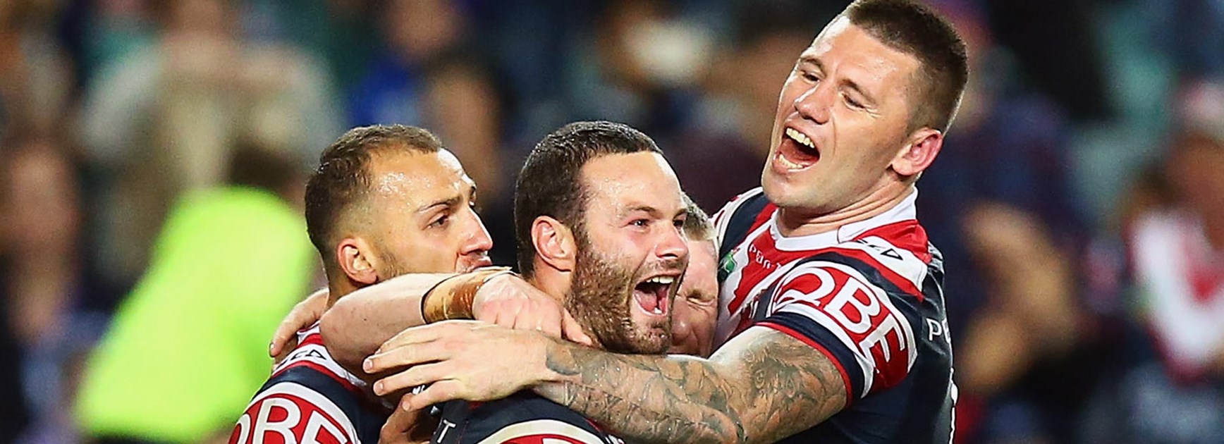 Roosters players celebrate a try in their semi-final win over the Dogs.