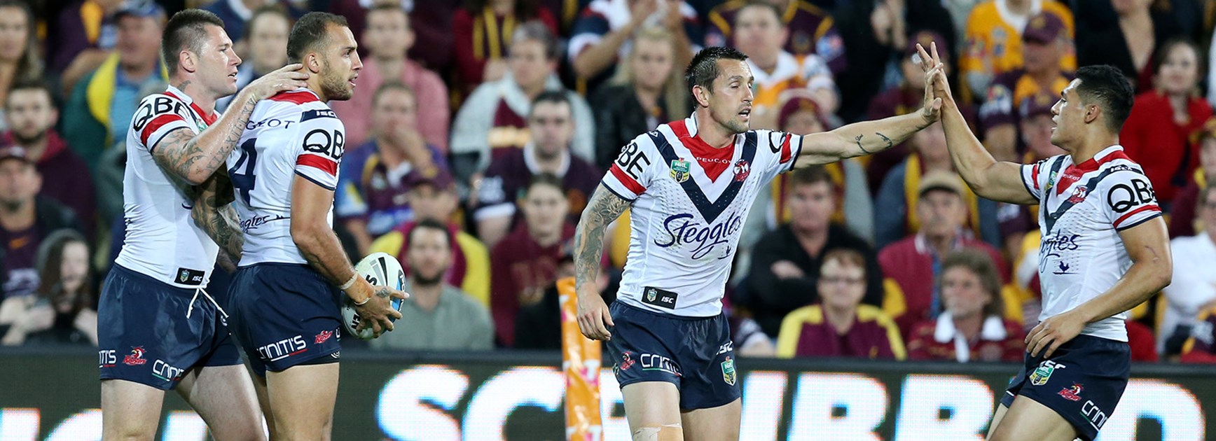 The Roosters celebrate a Blake Ferguson try in the preliminary final against the Broncos at Suncorp Stadium.
