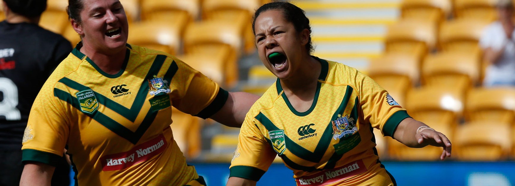 Jenny-Sue Hoepper celebrates her try in the Jillaroos' clash with the Kiwi Ferns.