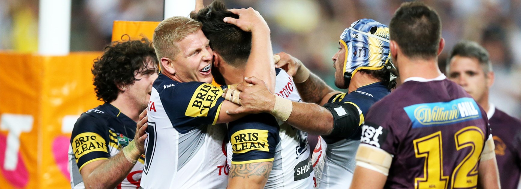 The Cowboys celebrate James Tamou's first-half try in the 2015 NRL Grand Final.