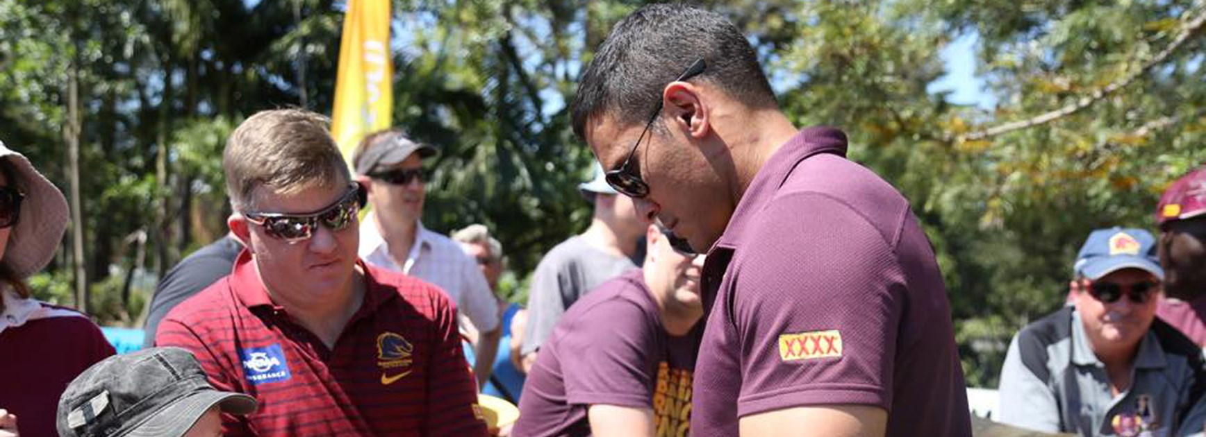 Retiring Broncos captain Justin Hodges with fans following the club's grand final loss.