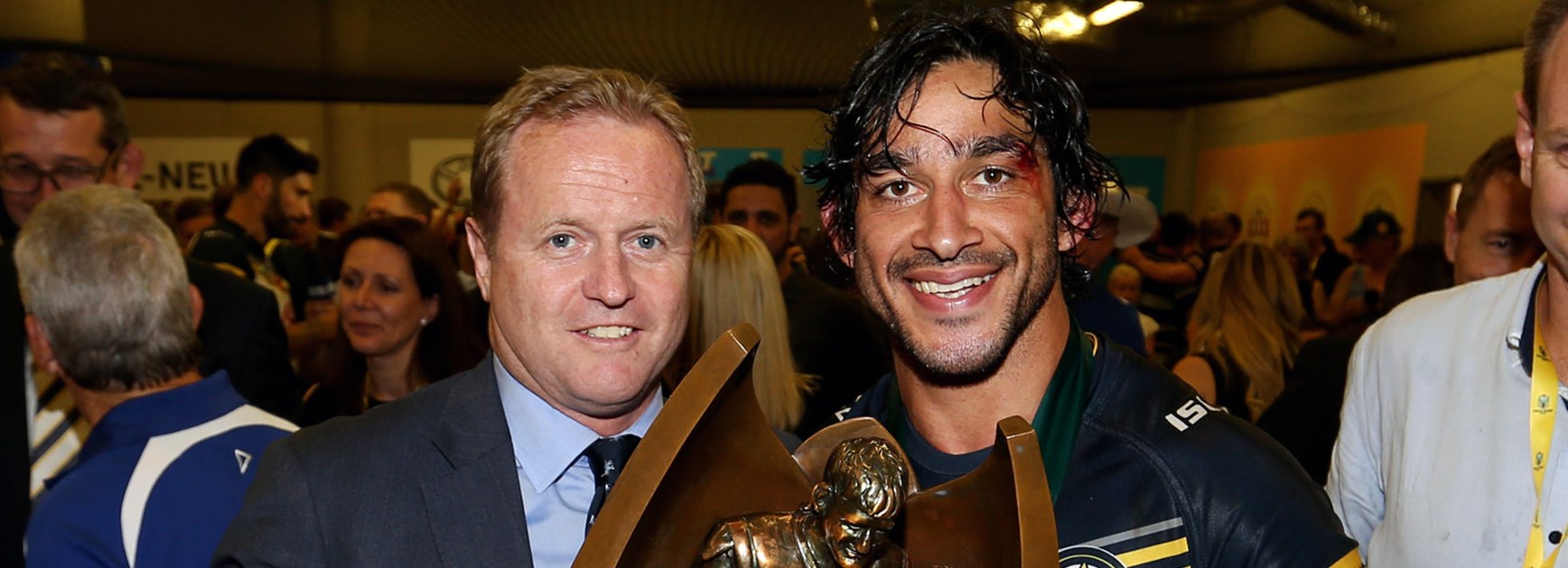 Departing NRL CEO Dave Smith with victorious Cowboys co-captain Johnathan Thurston following the 2015 Grand Final.