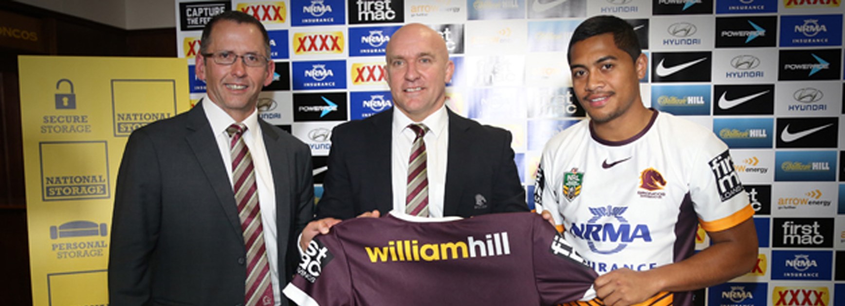 National Storage director Andrew Catsoulis, Broncos CEO Paul White and superstar five-eighth Anthony Milford with Brisbane's new away jersey for 2016.