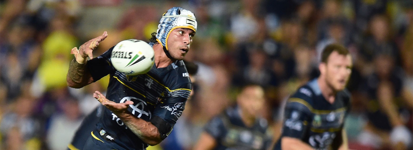 Johnathan Thurston takes a pass during the Cowboys' Round 1 clash with Cronulla.