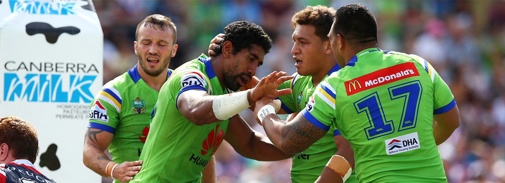 The Raiders celebrate Sia Soliola's try against the Roosters in Round 2.