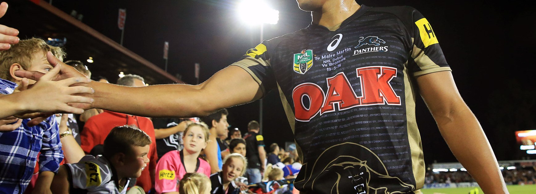 Te Maire Martin with Panthers fans following his NRL debut heroics.