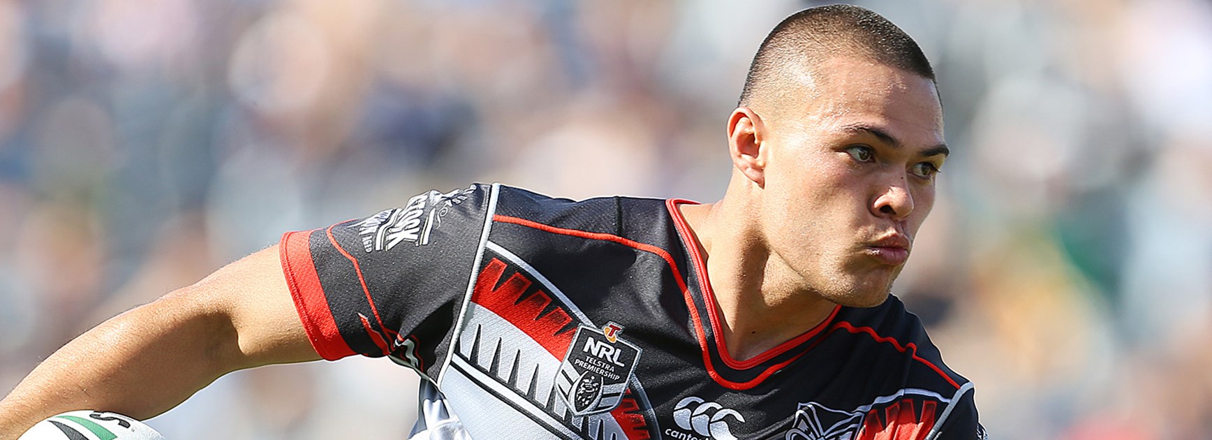 Tui Lolohea in action against the Roosters in Round 5.