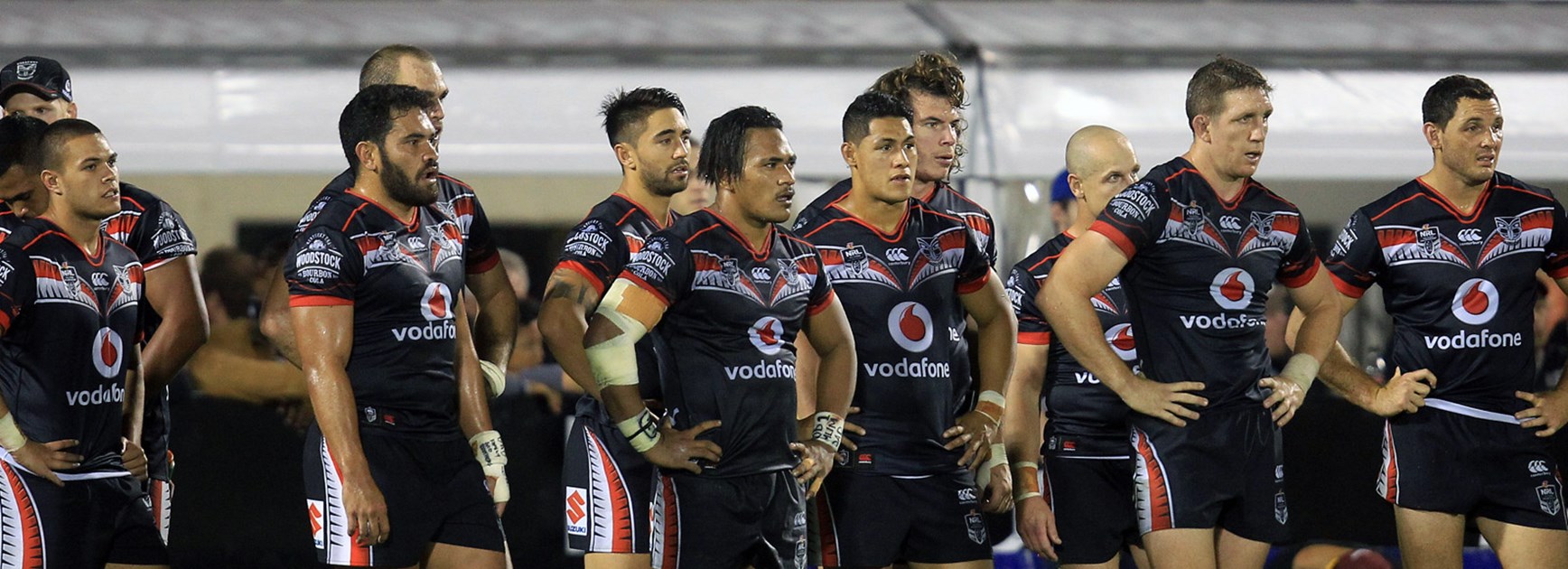 Warriors players look on dejected following their loss to the Sea Eagles.