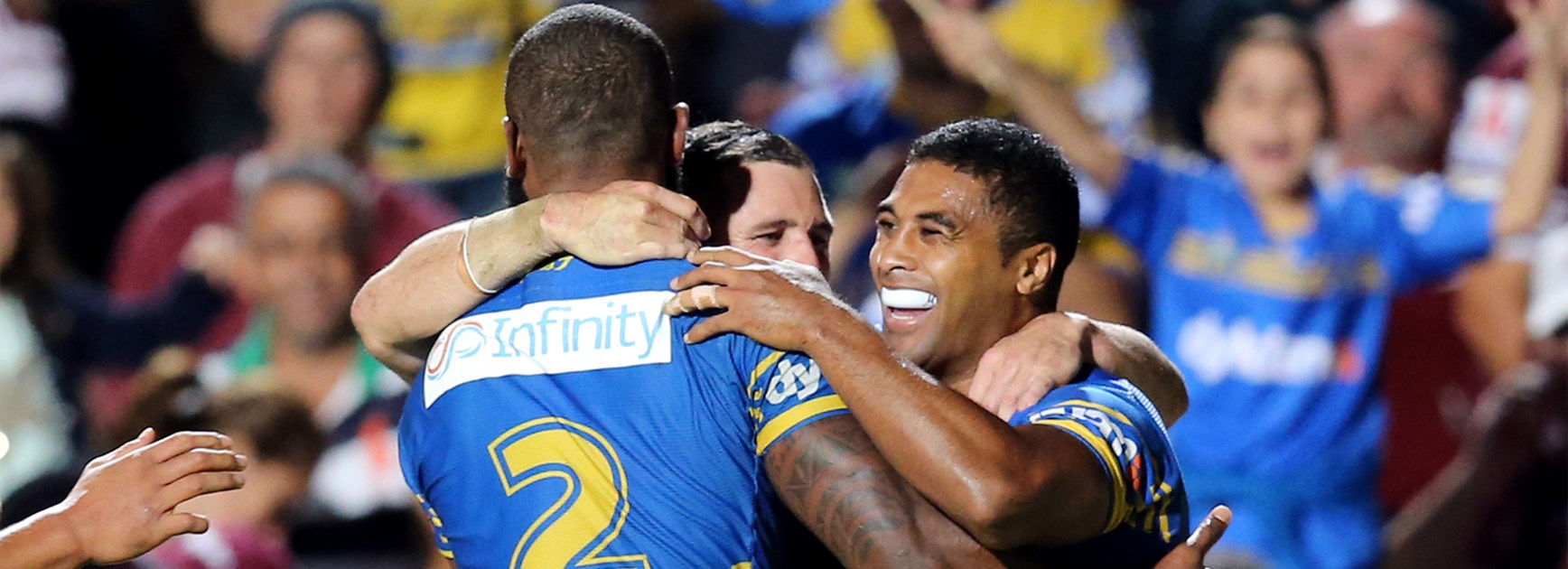 The Eels celebrate Michael Jennings' second try in his 200th NRL game.