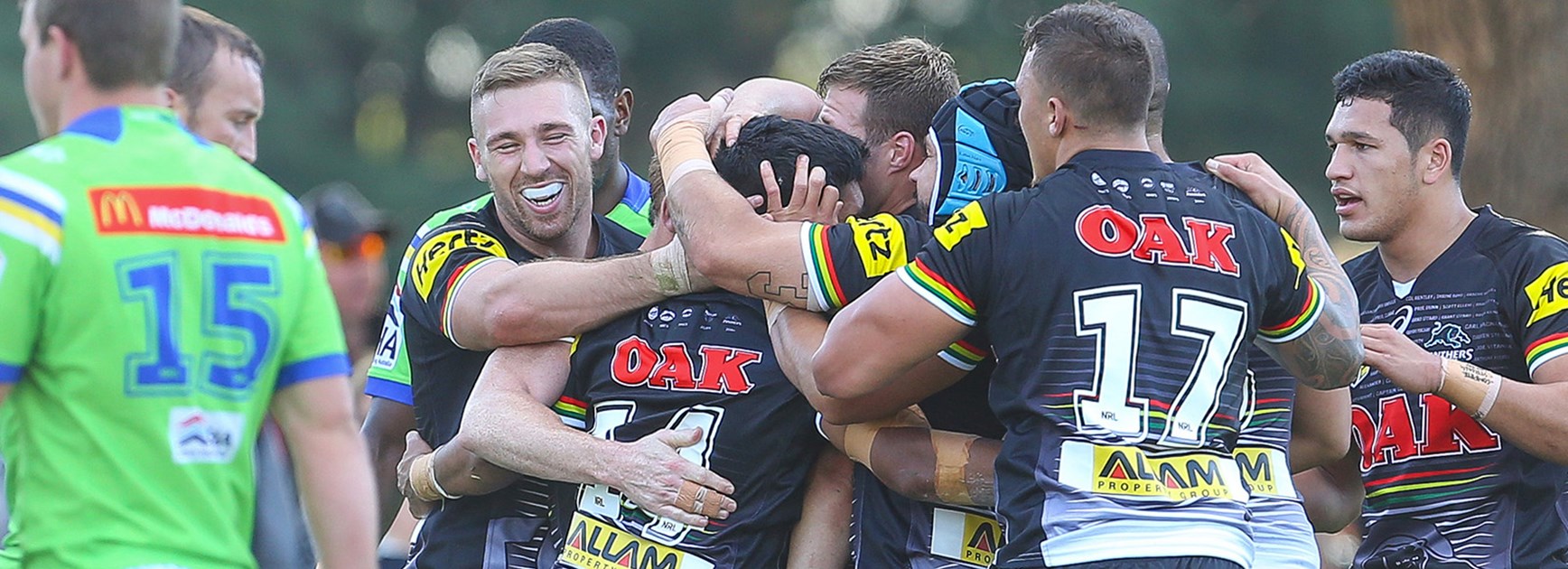 The Panthers celebrate a try against Canberra.