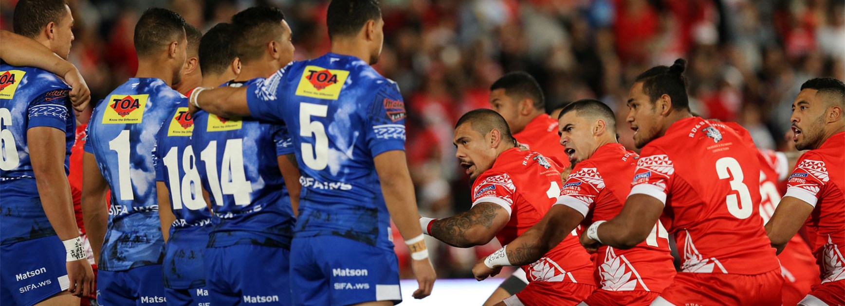 Samoa face off against Tonga's pre-game war dance on Saturday.