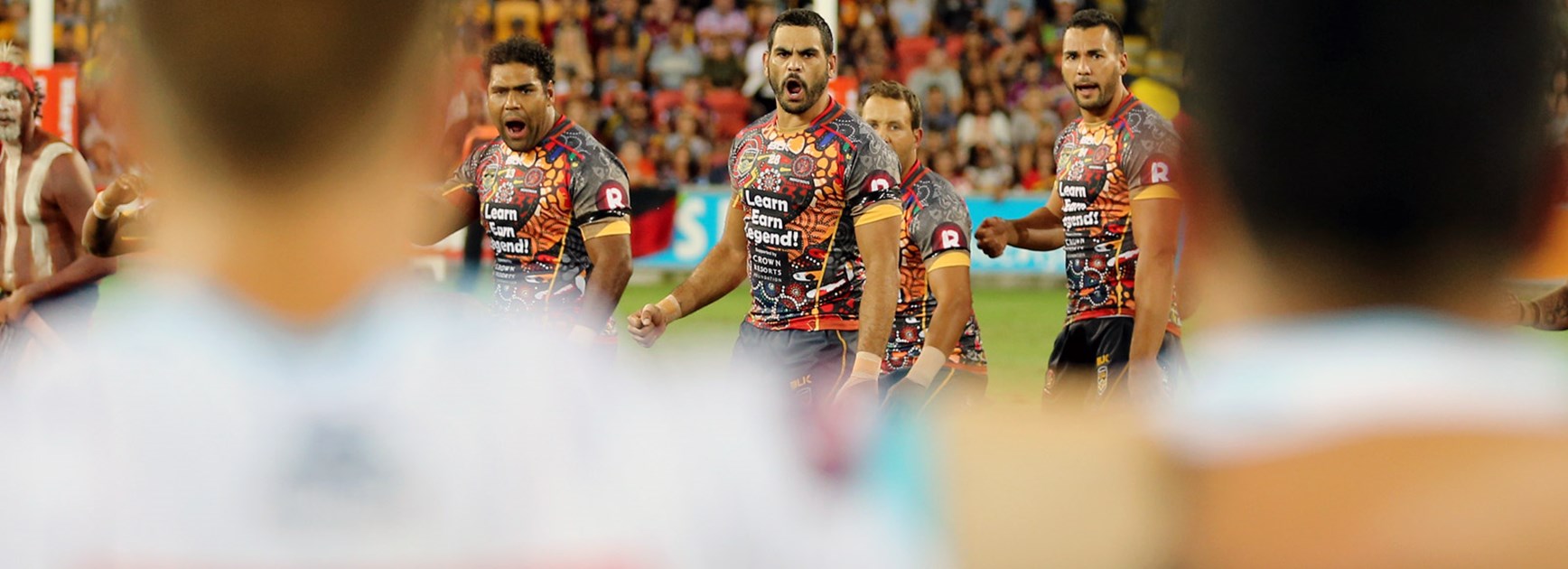 Greg Inglis leads the Indigenous All Stars during their pre-match war cry in the 2016 NRL All Stars match.