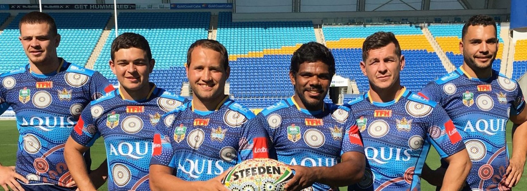 Titans players Nathan Davis, Ashley Taylor, Tyrone Roberts, Kierran Moseley, Greg Bird and Ryan James in the special Indigenous Round jersey.