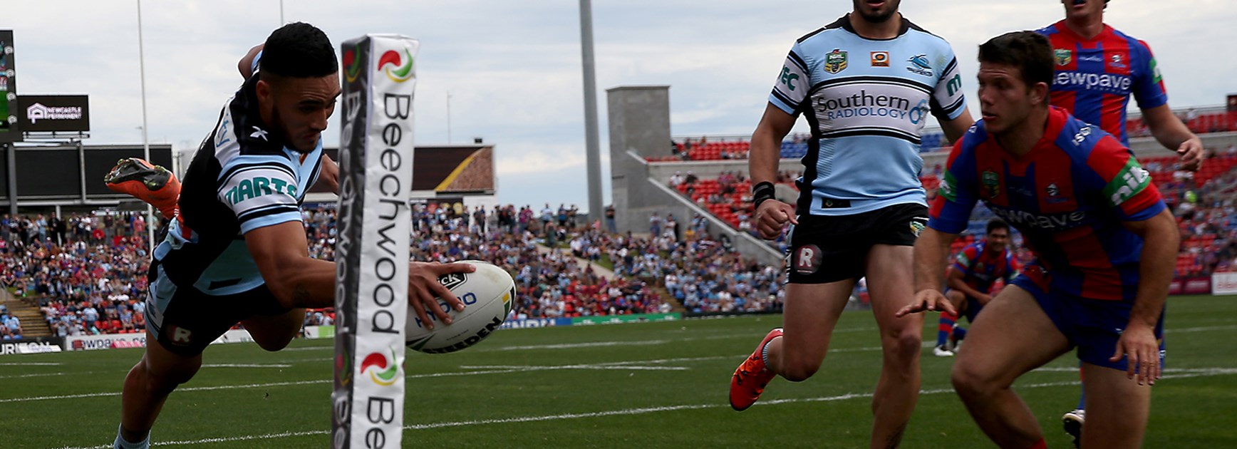Valentine Holmes scored a hat-trick in the first half against Newcastle.