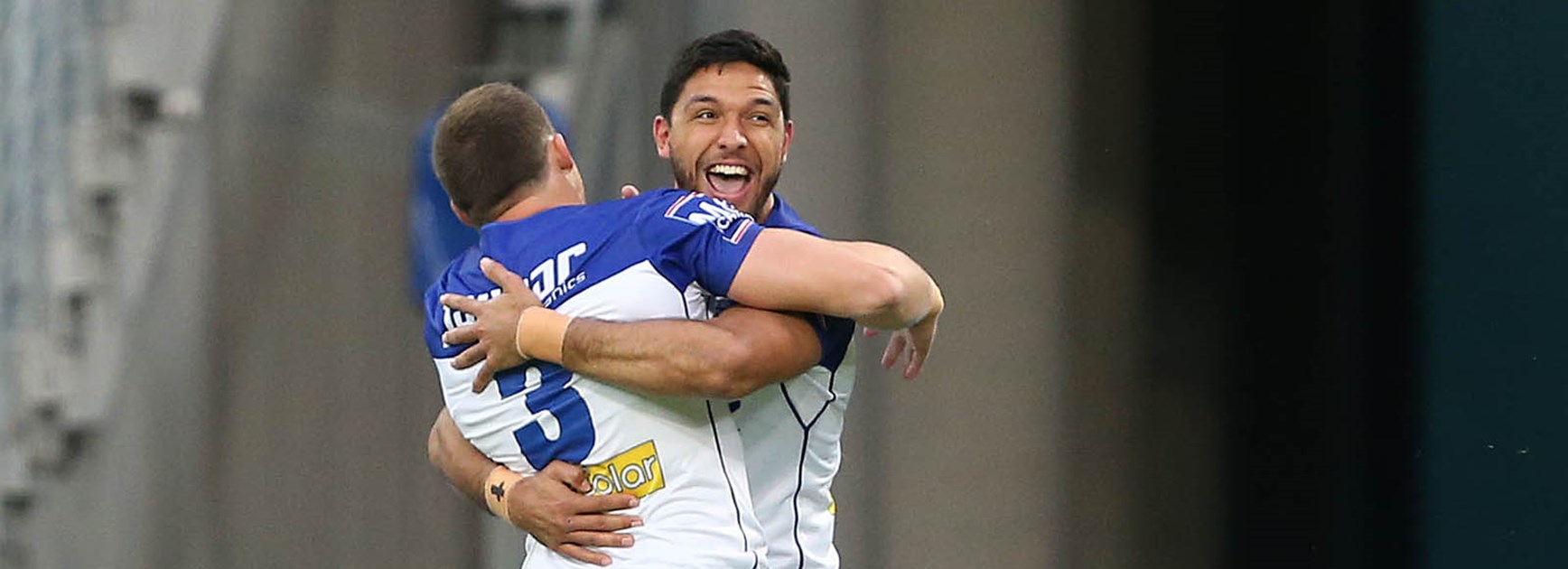 Bulldogs celebrate a try against the Wests Tigers at ANZ Stadium in Round 10.