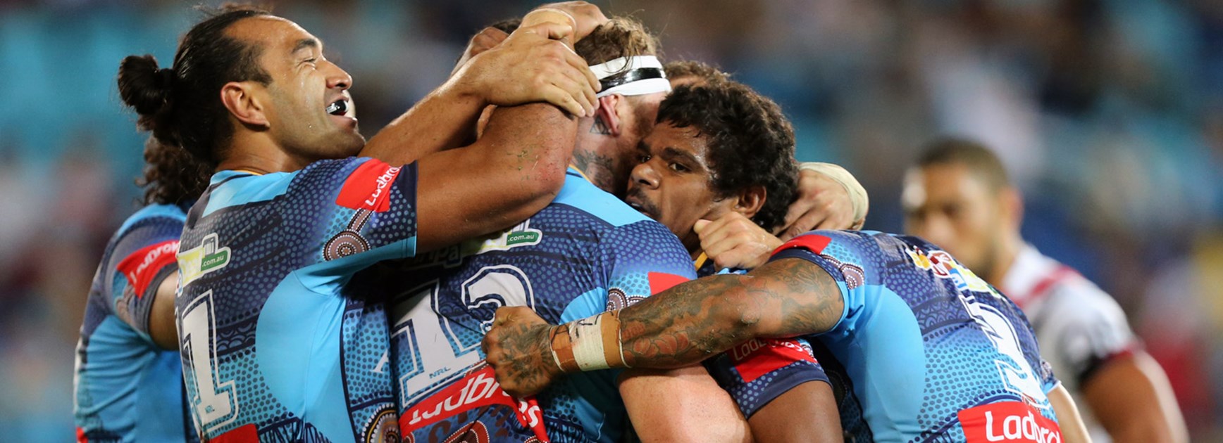 Titans players celebrate during their win over the Roosters.
