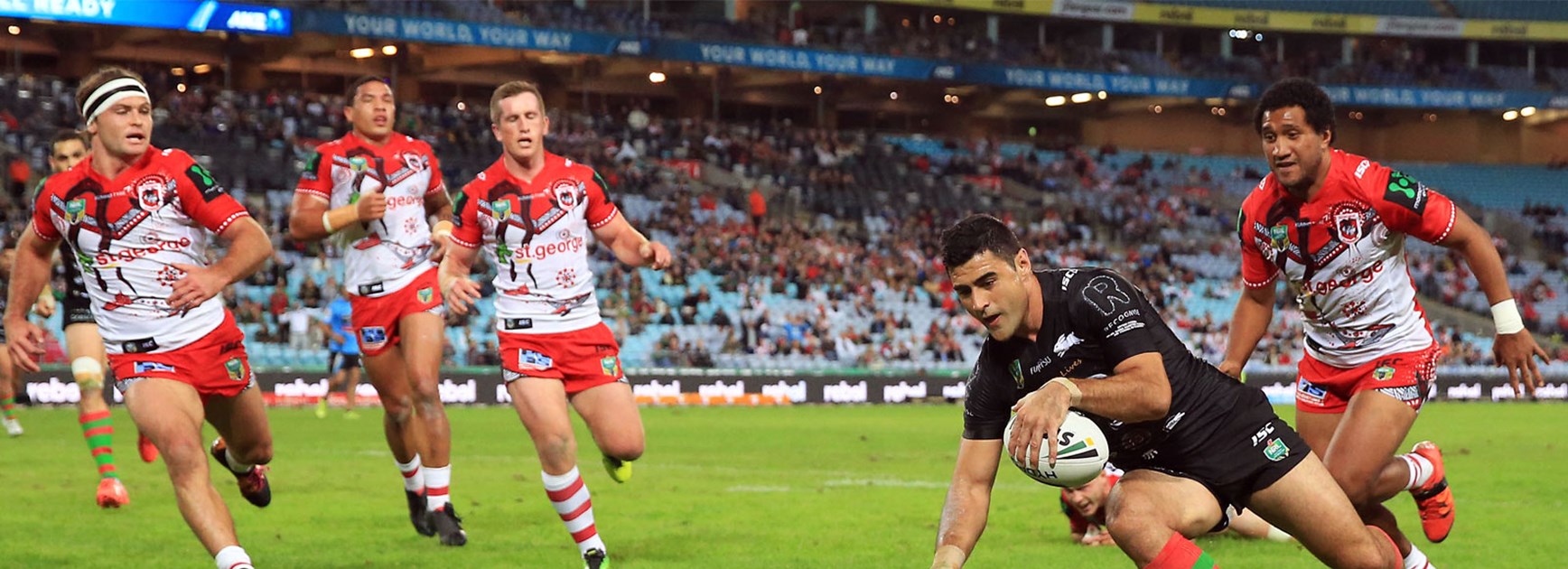 Bryson Goodwin crosses for the Rabbitohs against the Dragons on Thursday night.