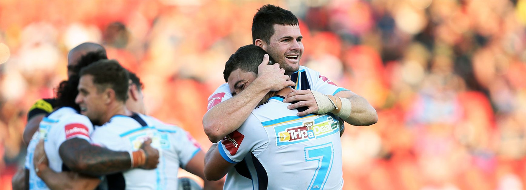The Gold Coast Titans celebrate their match-winning try against Penrith on Sunday