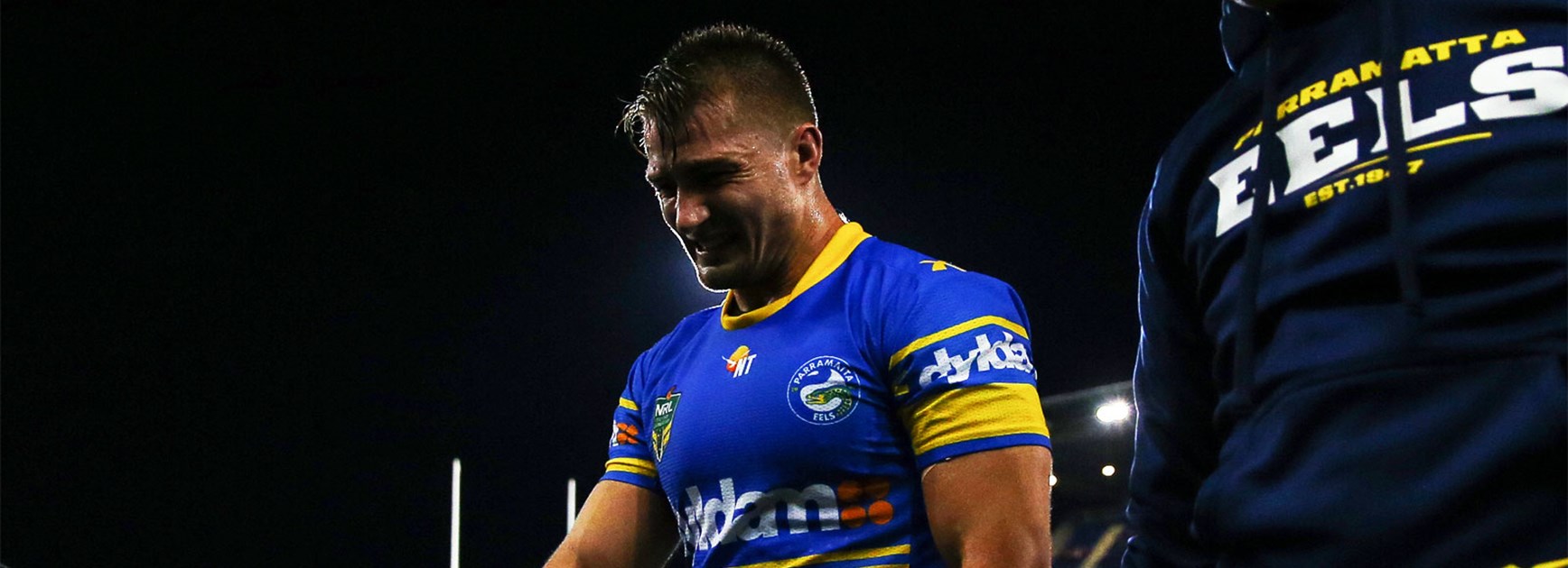 Kieran Foran leaves the field during the Eels' Round 12 clash with Newcastle.
