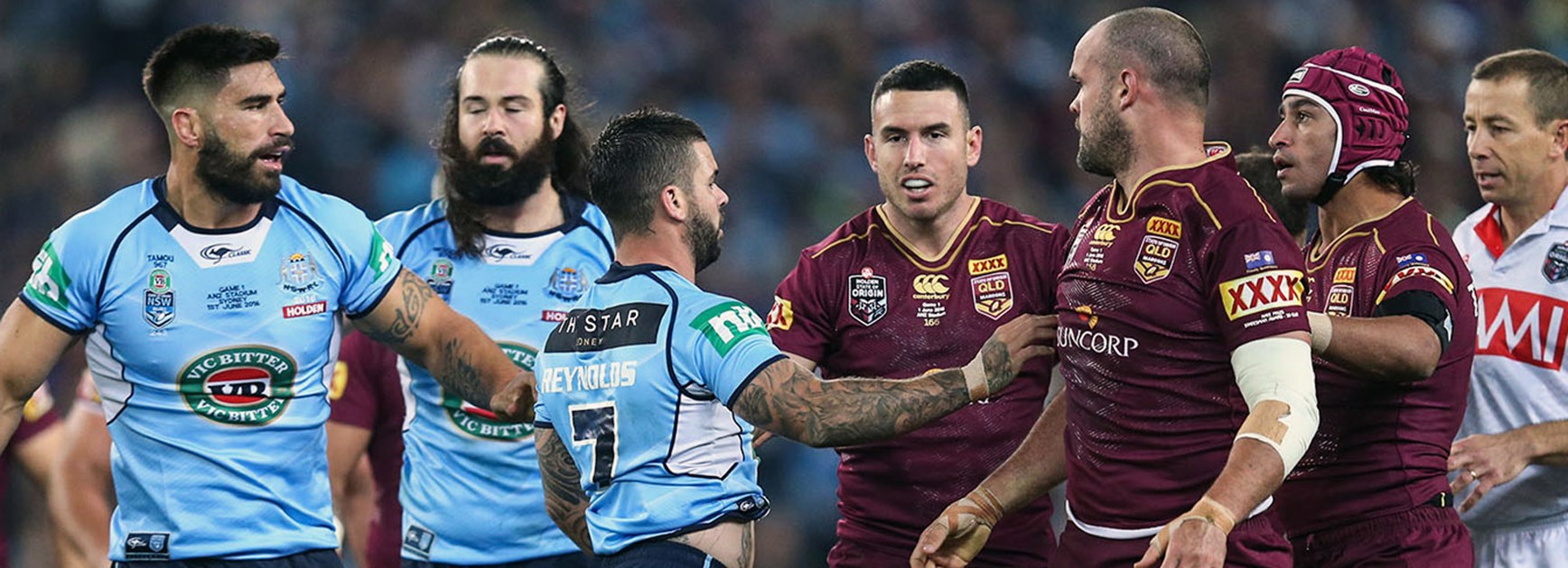 NSW and Queensland players come together during the opening game of the Origin series.