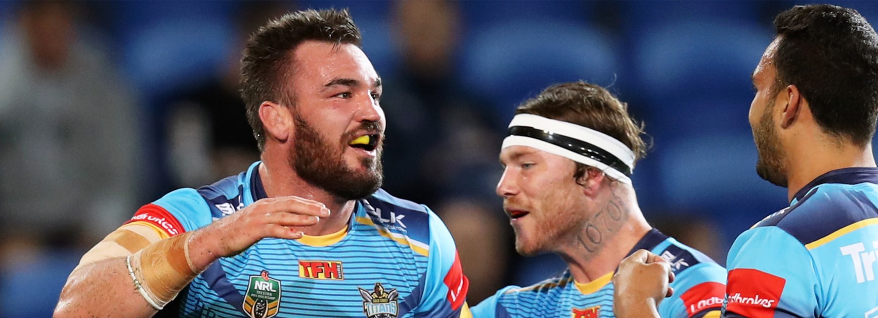 Titans front-rower Luke Douglas celebrates his try against Manly.