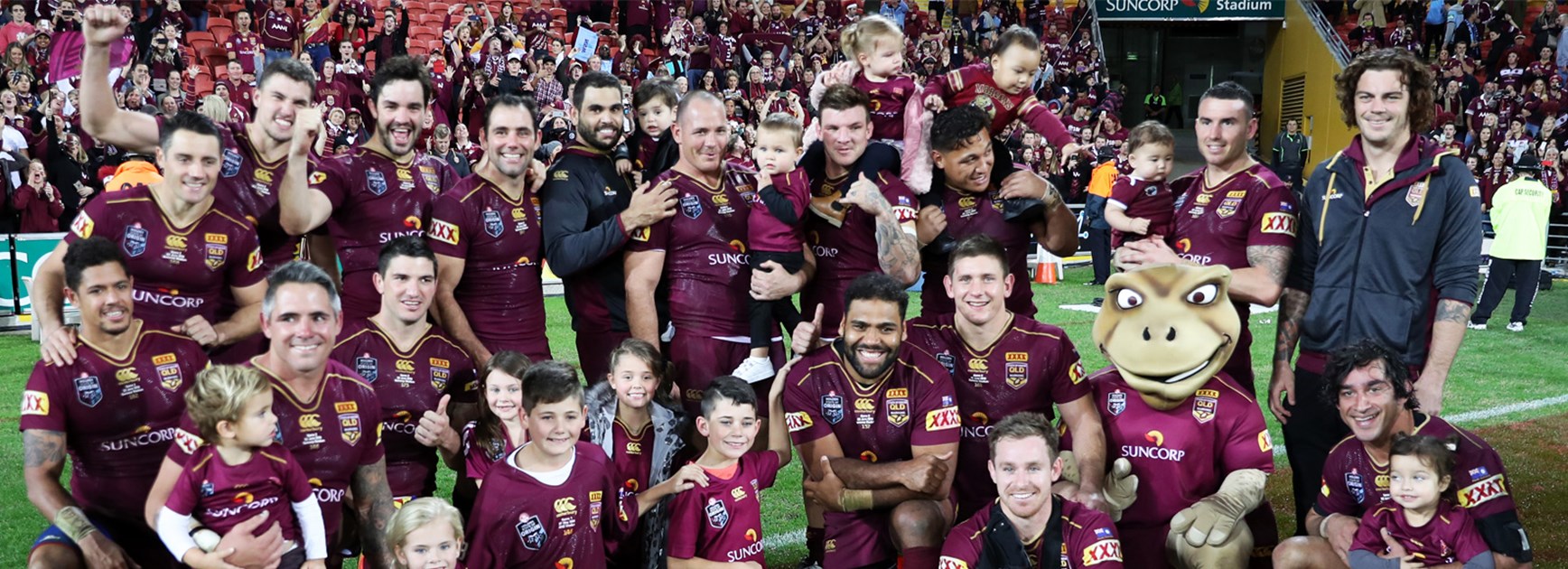 The victorious Queensland team celebrate winning the 2016 State of Origin series.