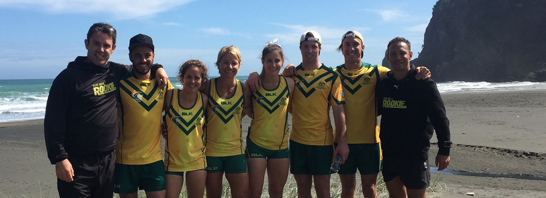 Members of the Australian touch football team with Brad Fittler.