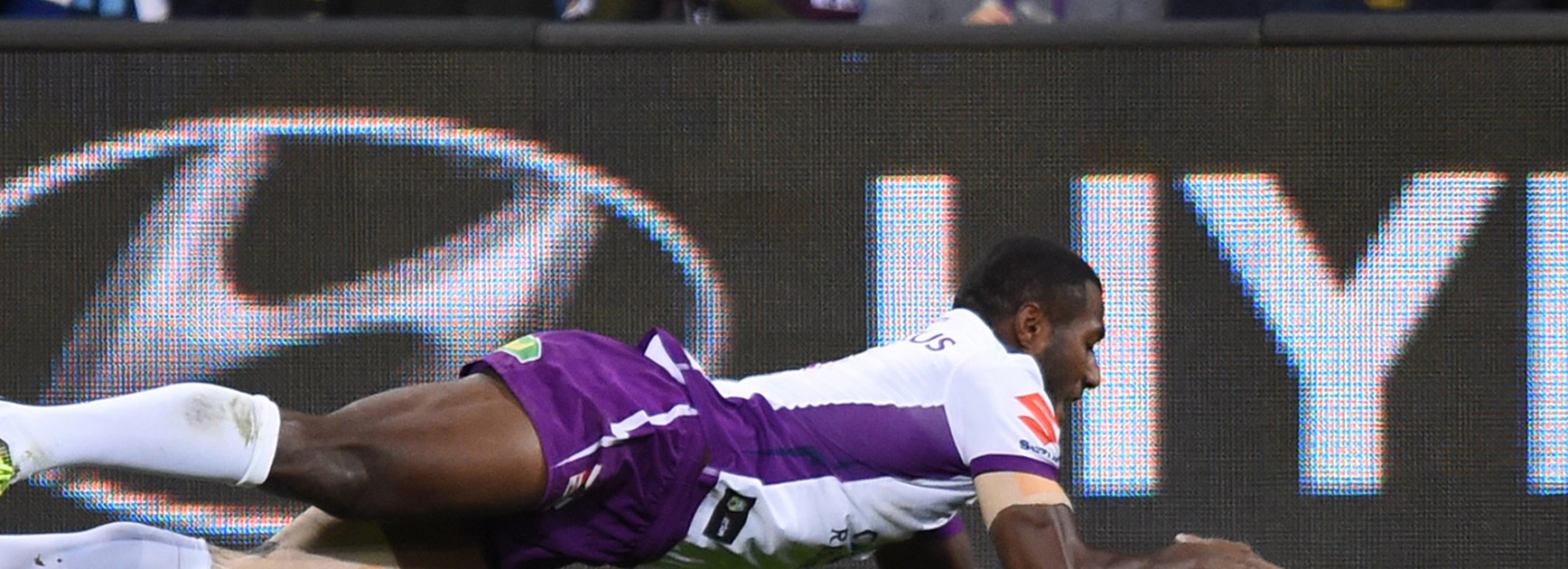 Suliasi Vunivalu scores another try for the Storm against the Broncos at Suncorp Stadium.