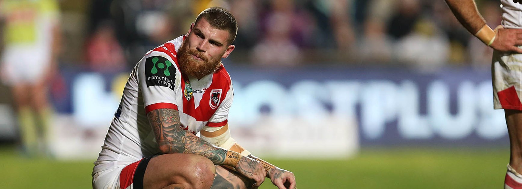 Josh Dugan on his haunches after another Manly try at Brookvale Oval on Monday night.