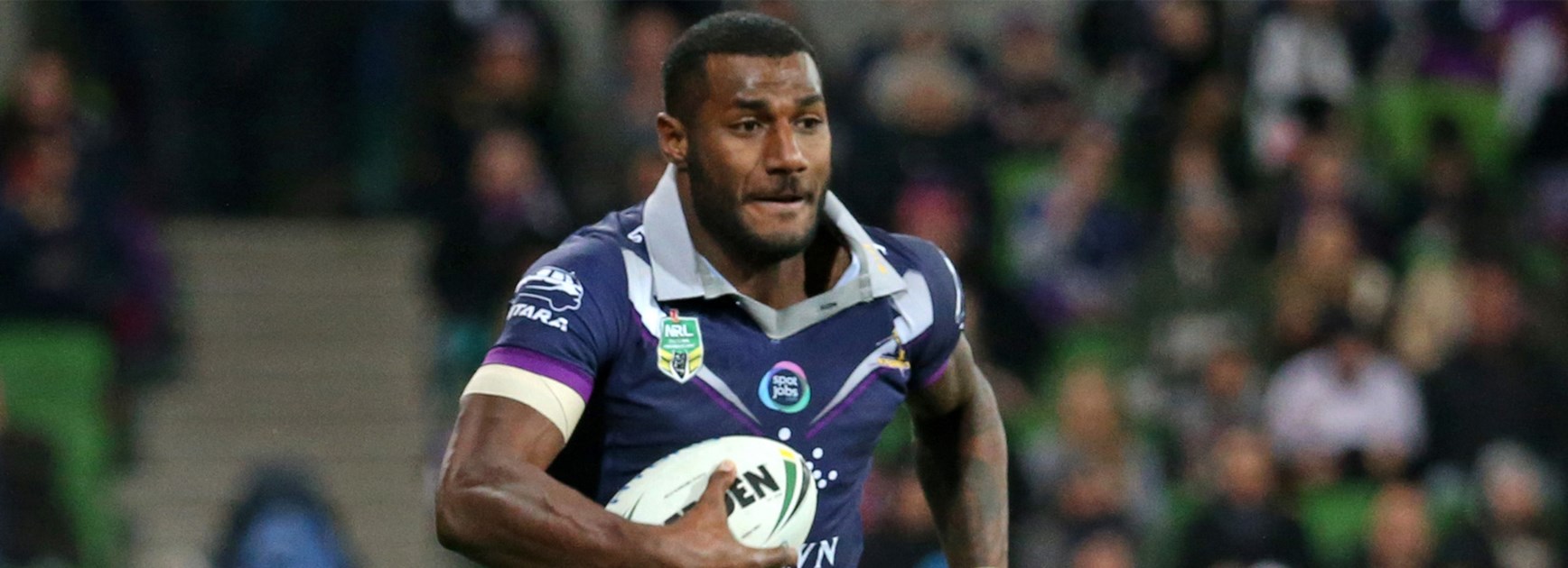 Storm winger Suliasi Vunivalu runs clear against the Roosters in Round 20.