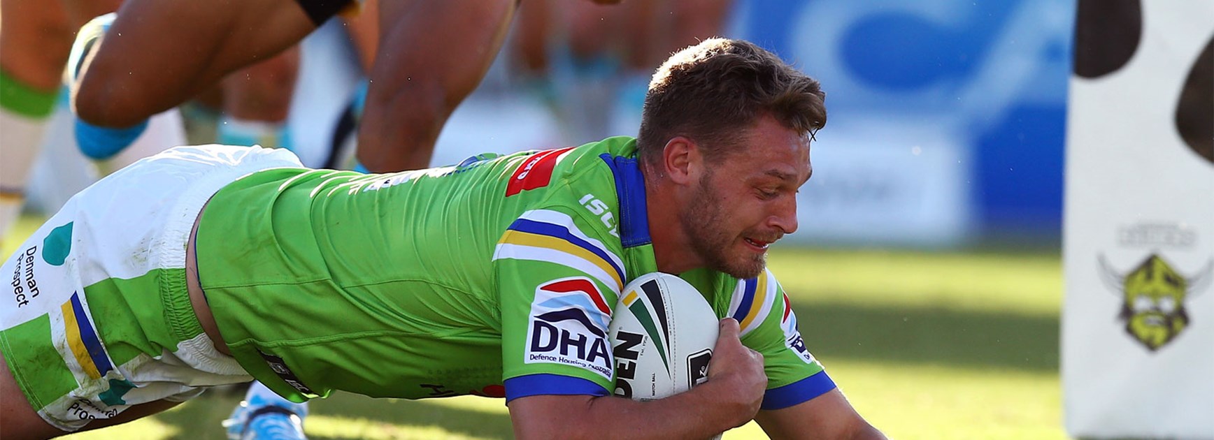 Raiders forward Elliot Whitehead scores for Canberra against the Titans on Saturday.