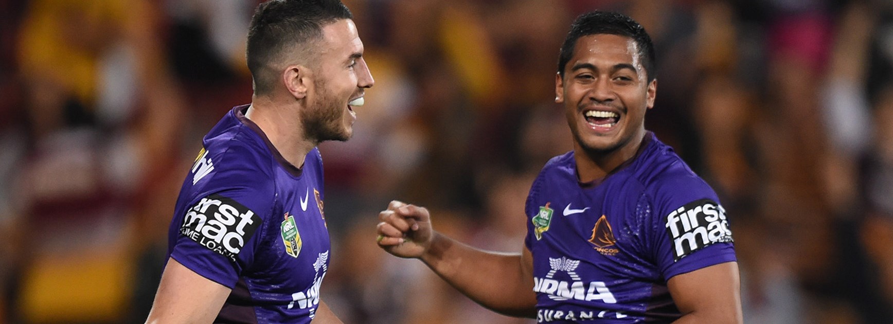 Anthony Milford and Darius Boyd celebrate during the Broncos win over the Eels.