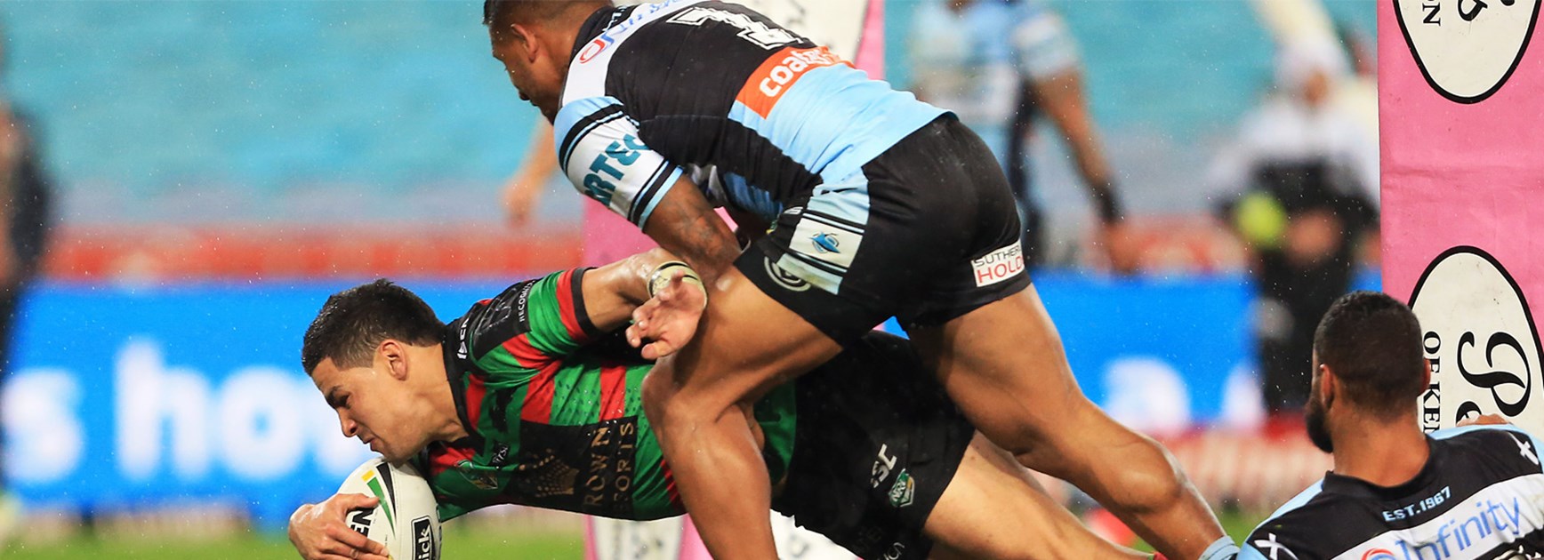 Cody Walker scores for the Rabbitohs against Cronulla in Round 24.