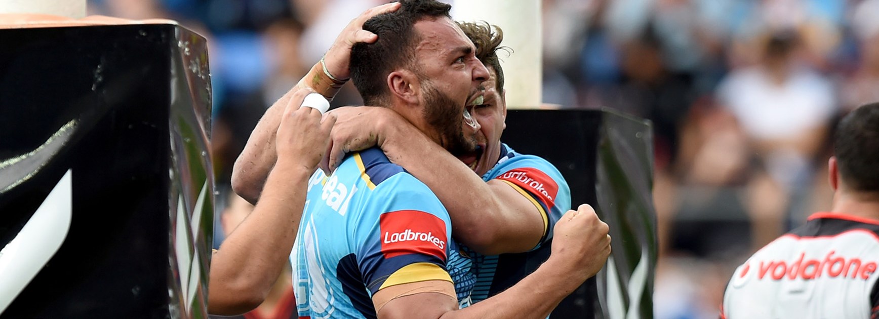 The Titans celebrate a try to Ryan James.
