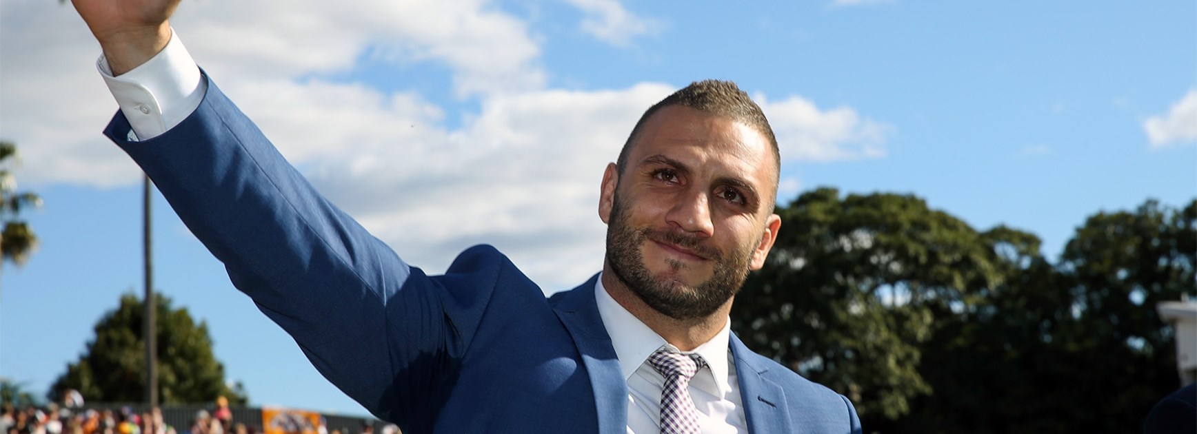 Robbie Farah waves to the crowd at half-time of the Tigers' final game of the 2016 season.