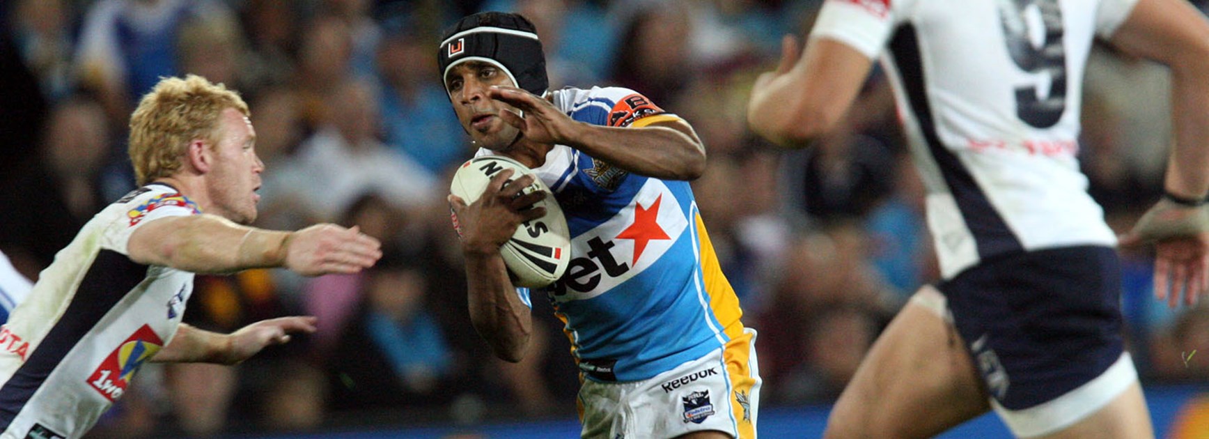 Preston Campbell takes on the Broncos defence in the 2009 Finals series.